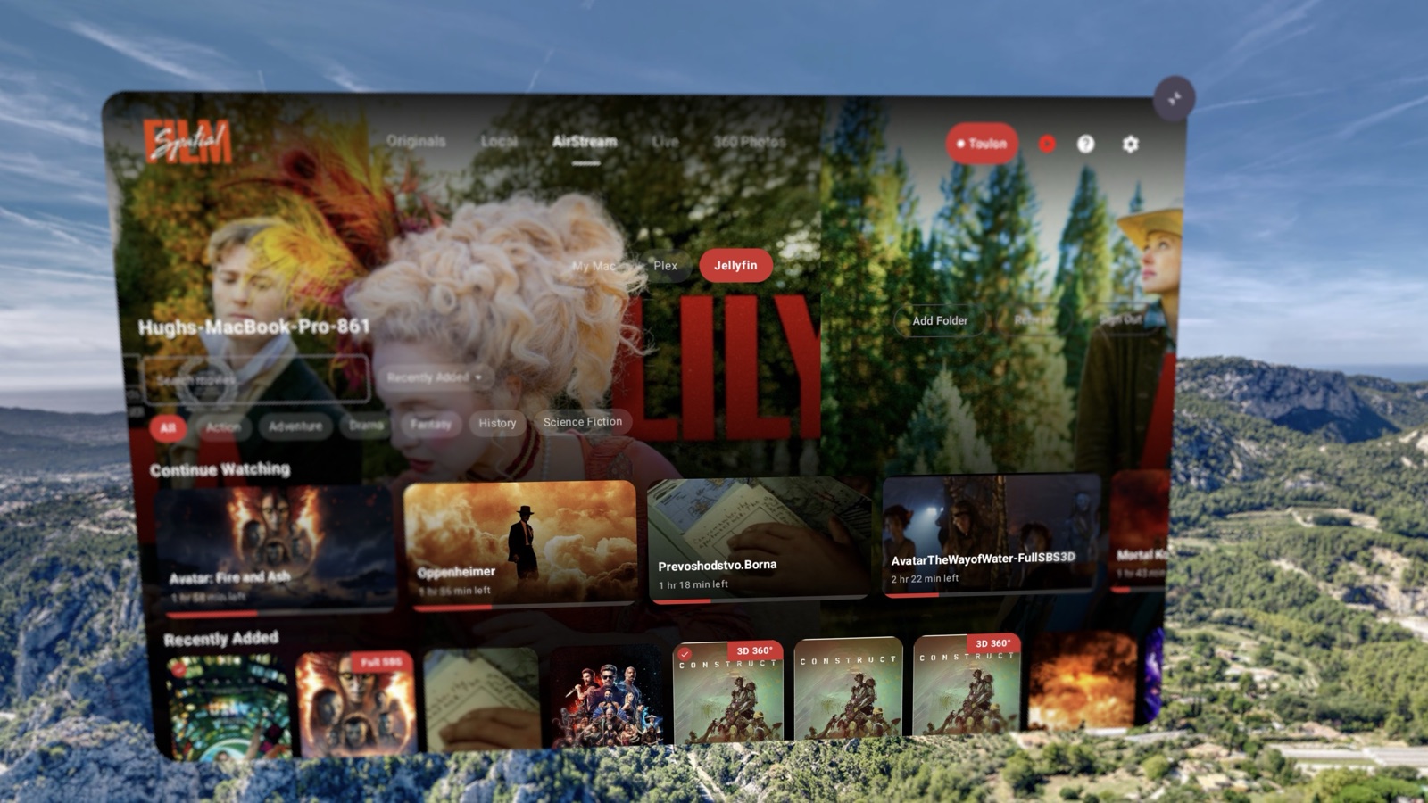 Spatial Film on Samsung Galaxy XR — a Jellyfin movie library floating over a Provence valley, with My Mac, Plex and Jellyfin source chips, Continue Watching and Recently Added shelves, genre filters, and resume bars on Avatar: Fire and Ash and Oppenheimer.