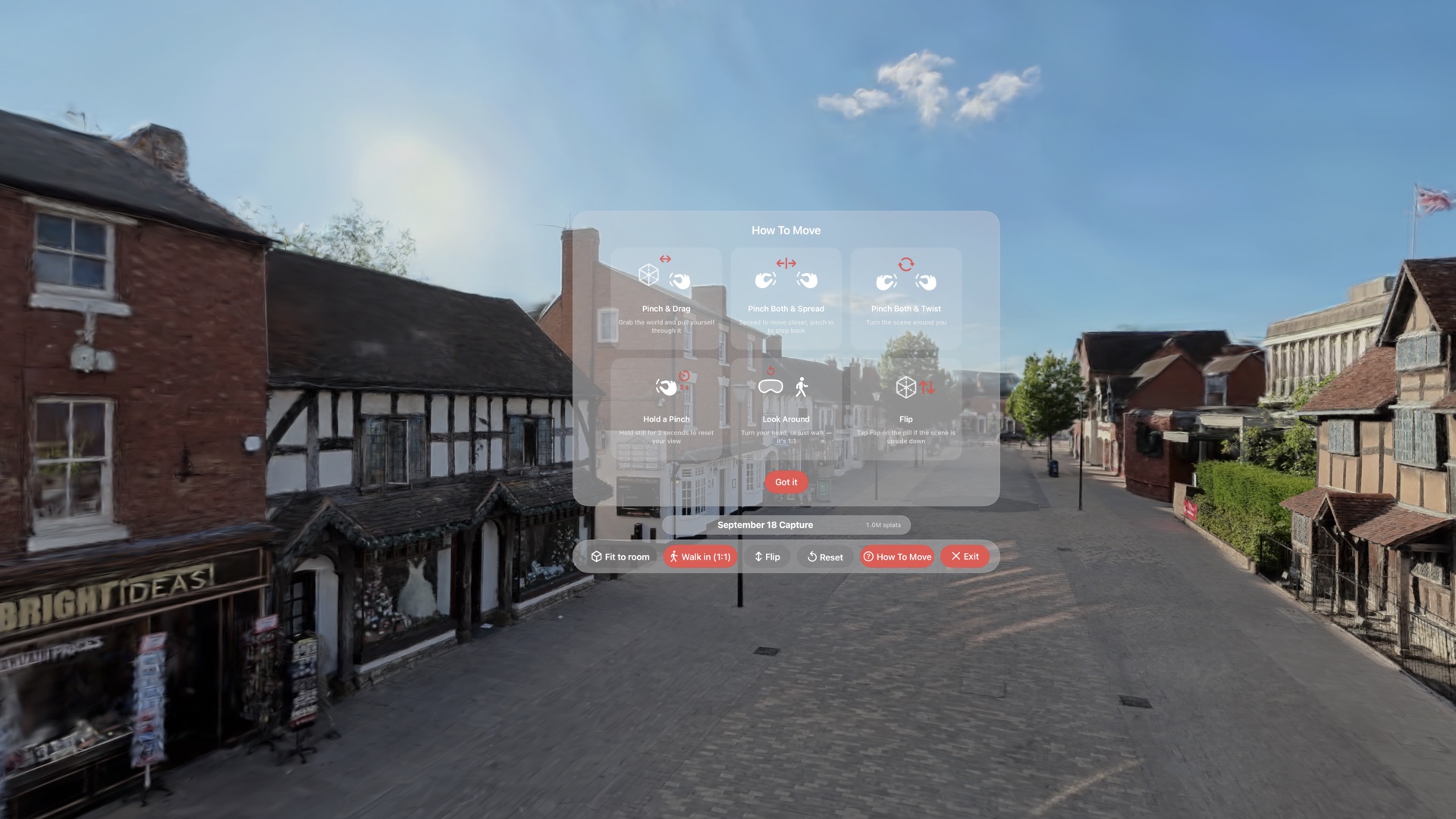 The How To Move guide in Splat Player, a glass panel over the Henley Street scene showing six gestures: pinch and drag, pinch both and spread, pinch both and twist, hold a pinch, look around, and flip