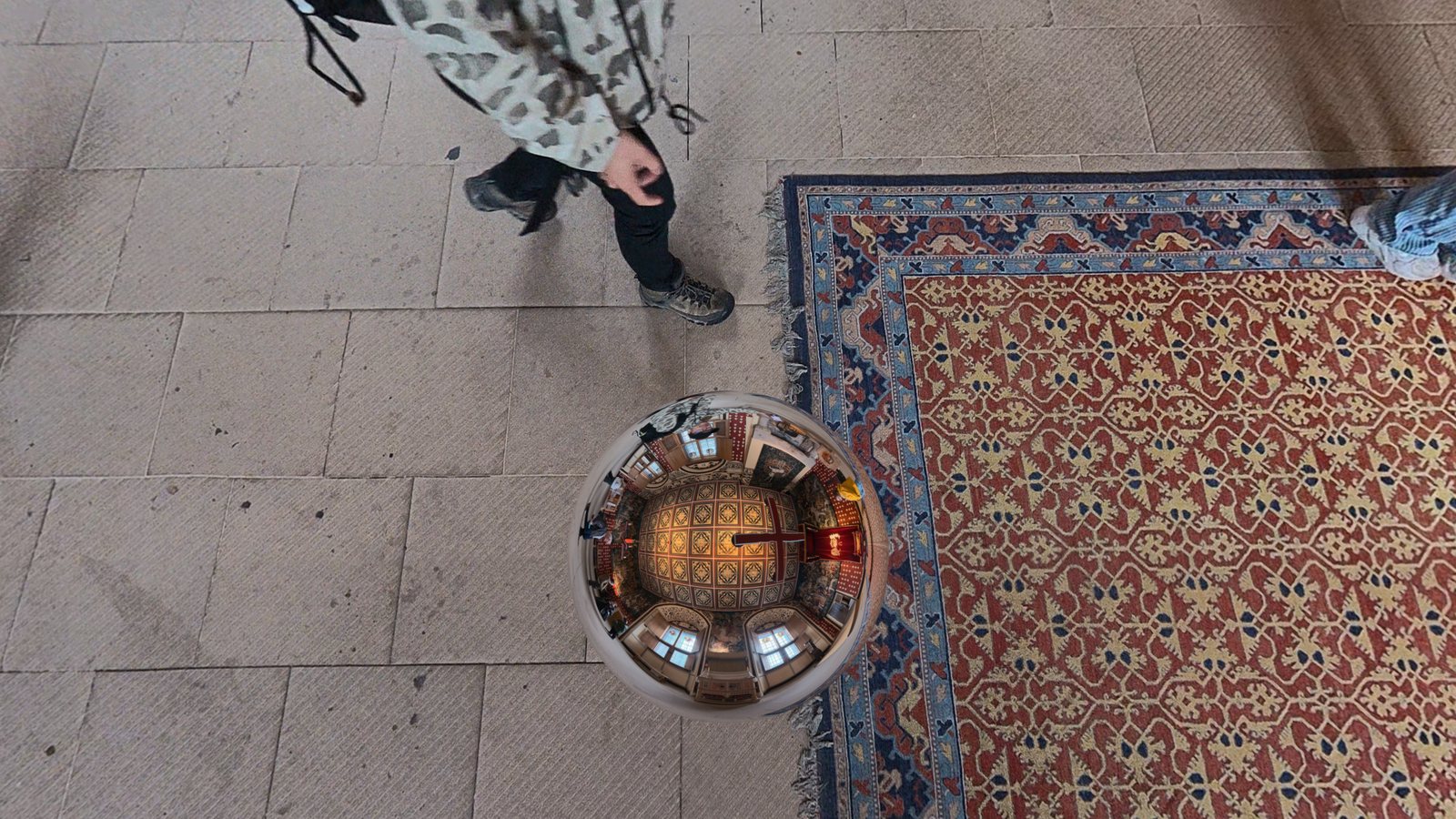 After: Spatial Film Chrome Ball covers the tripod with a chrome ball that reflects the painted ceiling and windows.