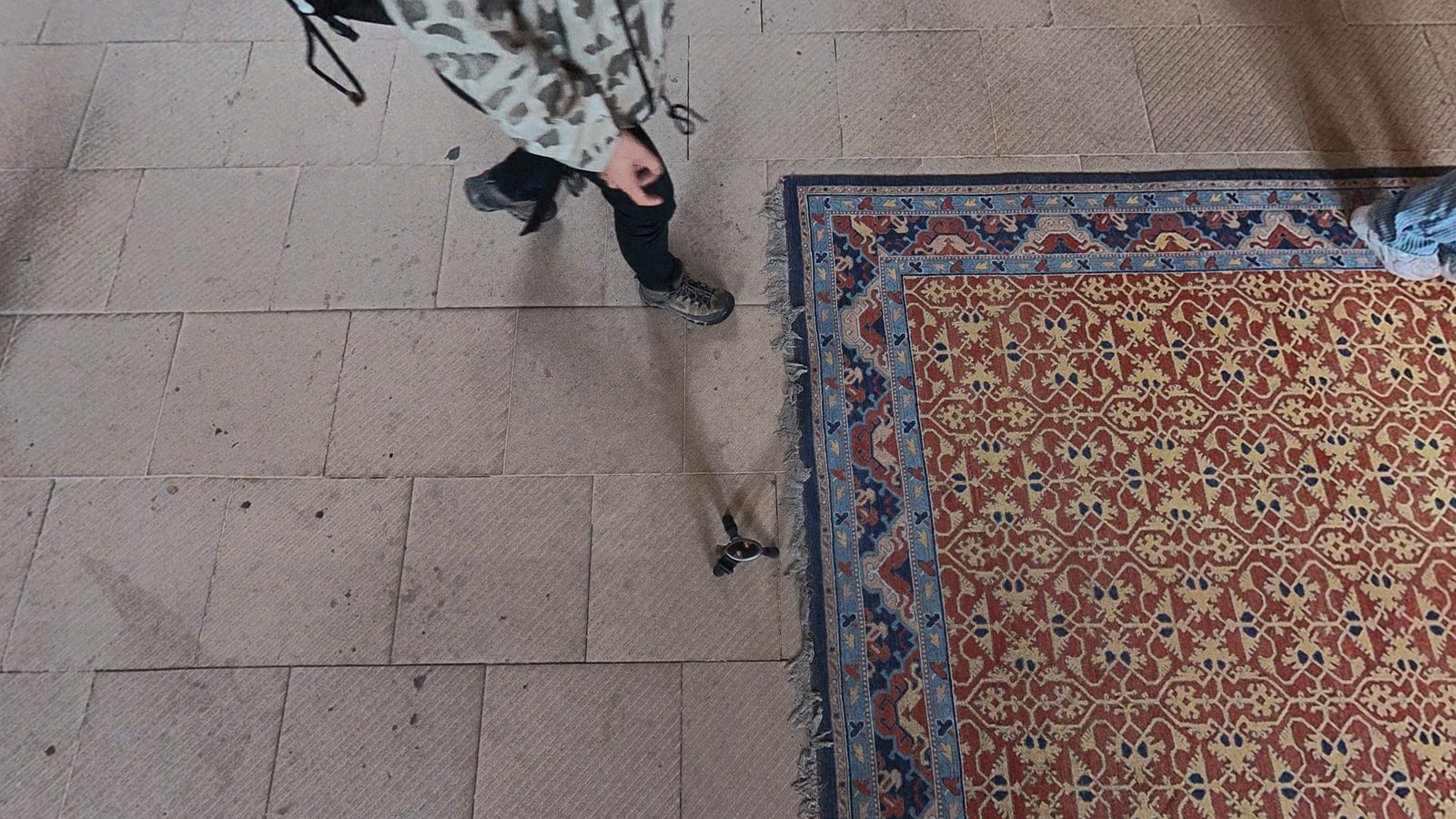 Before: the tripod is visible on the stone floor of a Stirling Castle chamber.